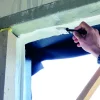 Aanbrengen van AB-Sealant met een kitspuit.